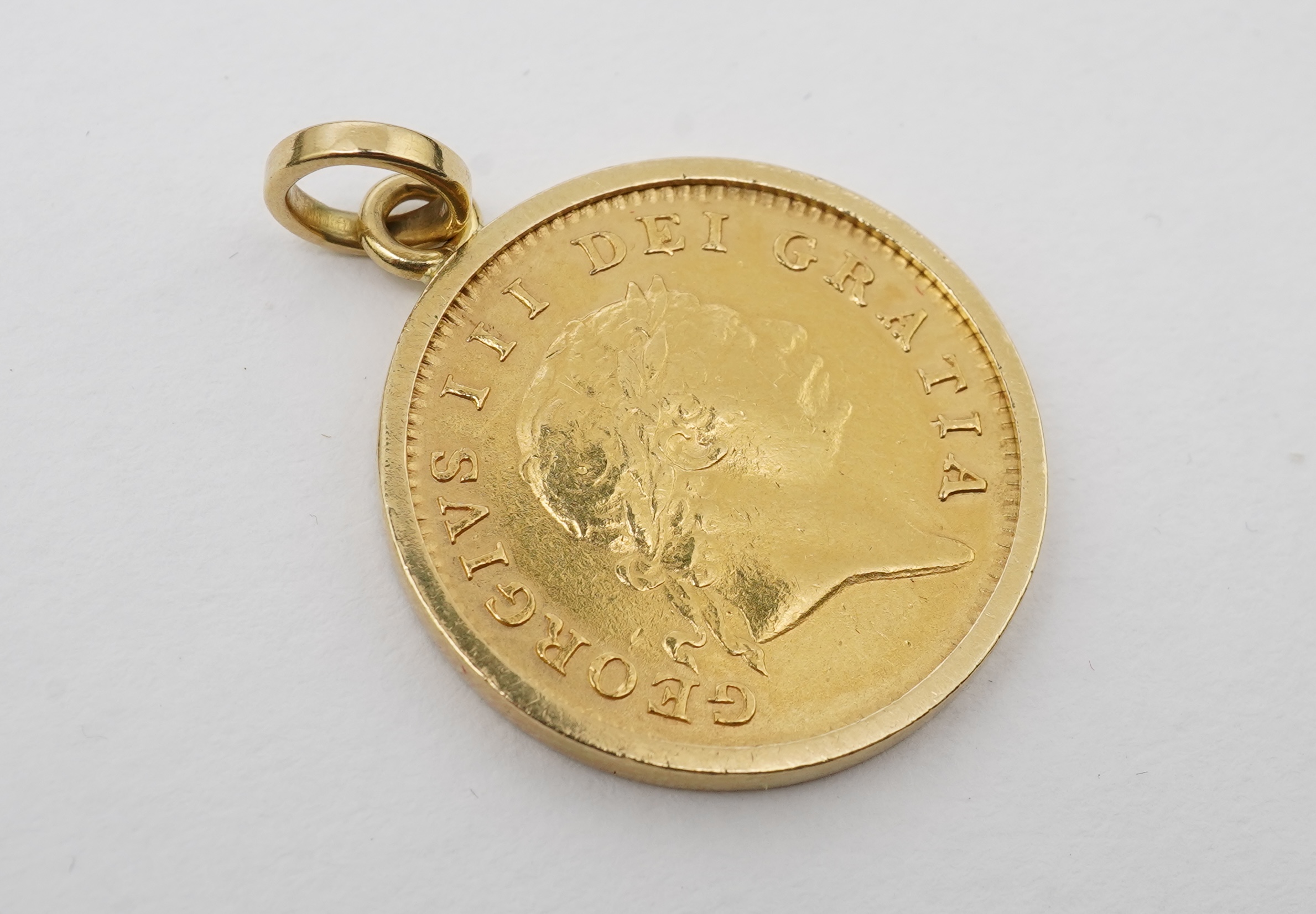 A George III half guinea pendant, circa 1804 and later